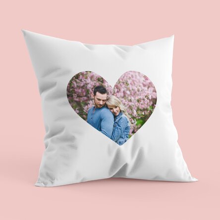 Personalised cushion with a heart-shaped photo