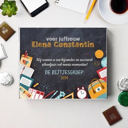 Gepersonaliseerd bonbonnière met een nieuwjaarsboodschap voor de leraar