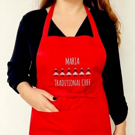 Customised apron with traditional embroidery on red
