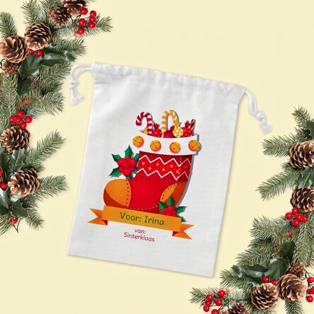 Kleine cadeautasje met naam erop – van Sinterklaas