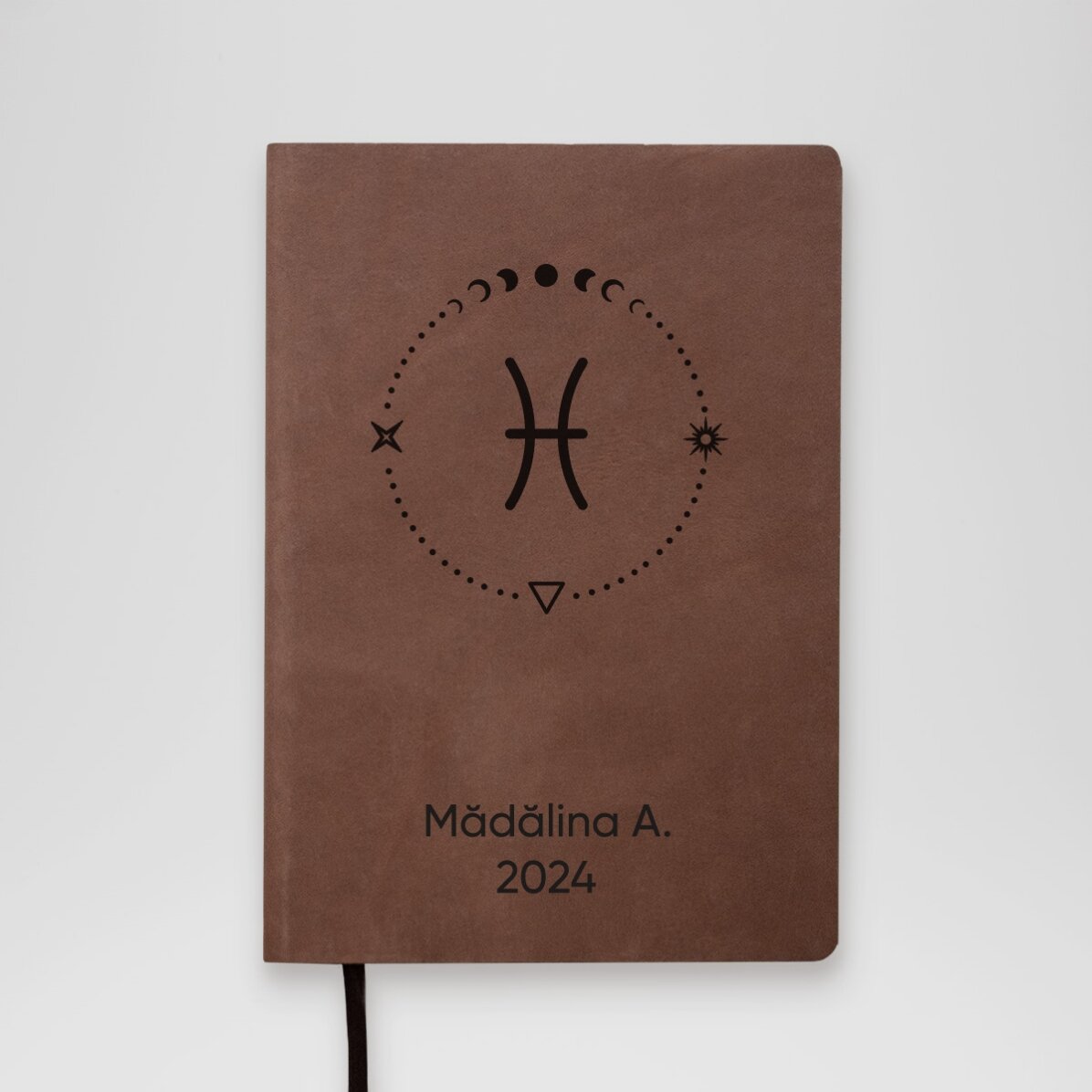 Personalised leather diary with text and Pisces zodiac sign