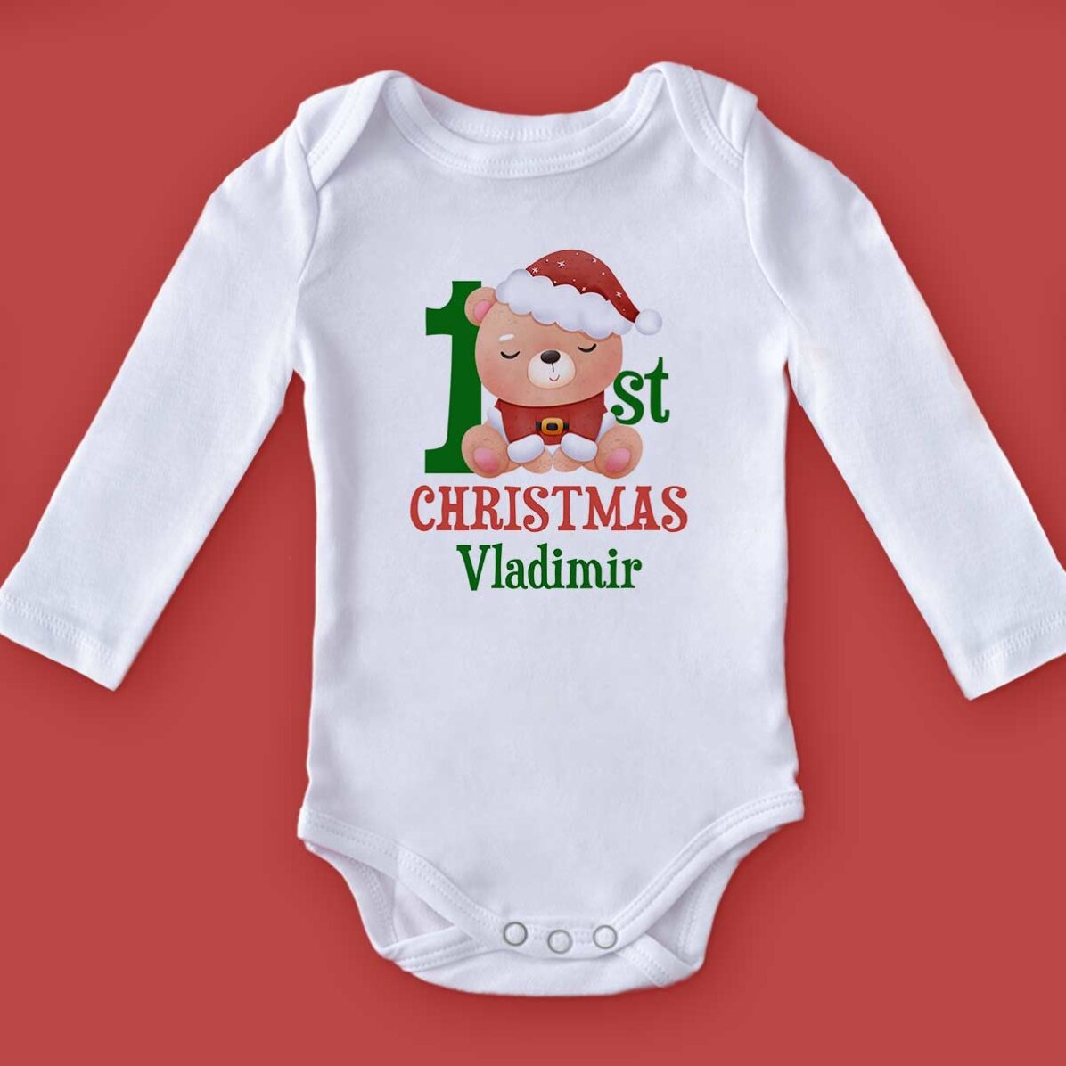 Gepersonaliseerd kinderpakje met tekst - Eerste Kerstmis