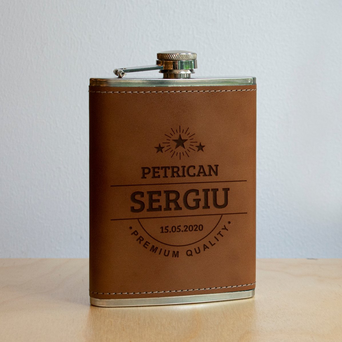 Personalised pocket flask covered in leather with name
