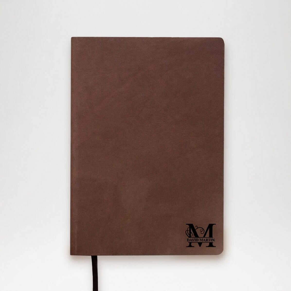 Gepersonaliseerde lederen agenda met monogram