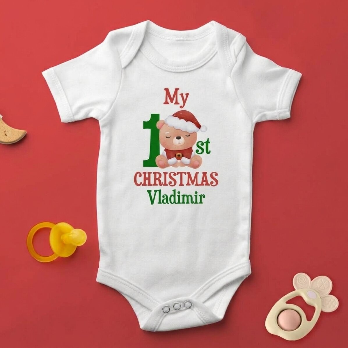 Gepersonaliseerd kinderpakje met tekst - Eerste Kerstmis