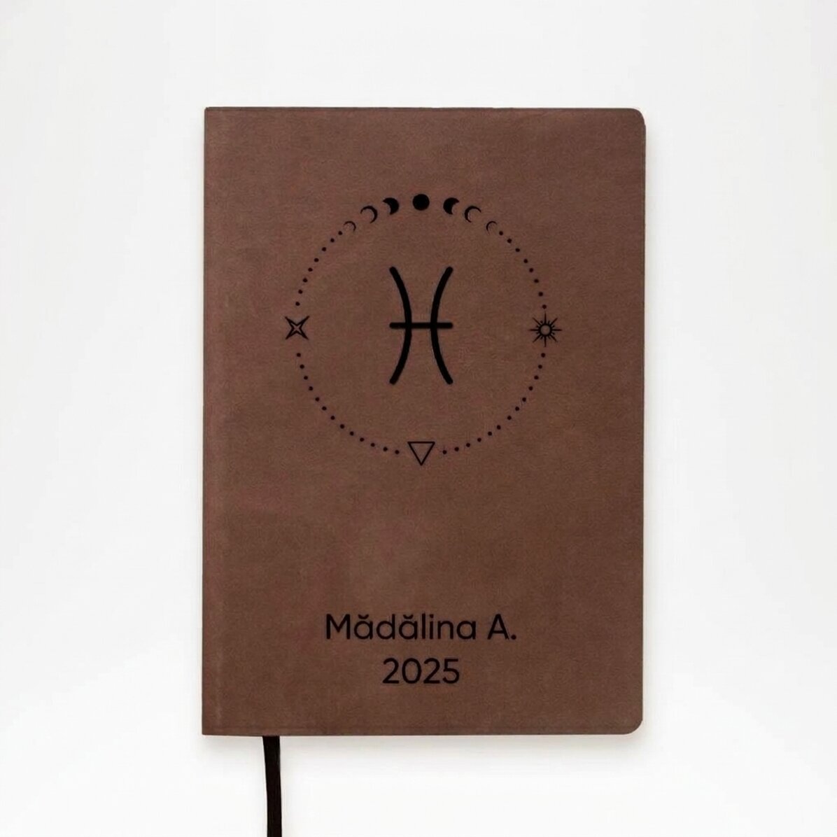 Personalised leather diary with text and Pisces zodiac sign