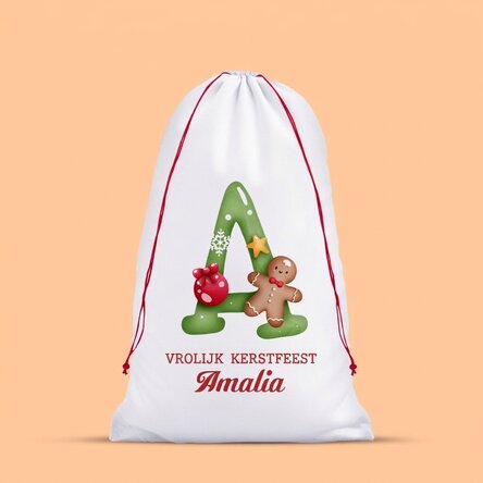 Witte cadeauzak, gepersonaliseerd met een initiaal en een boodschap