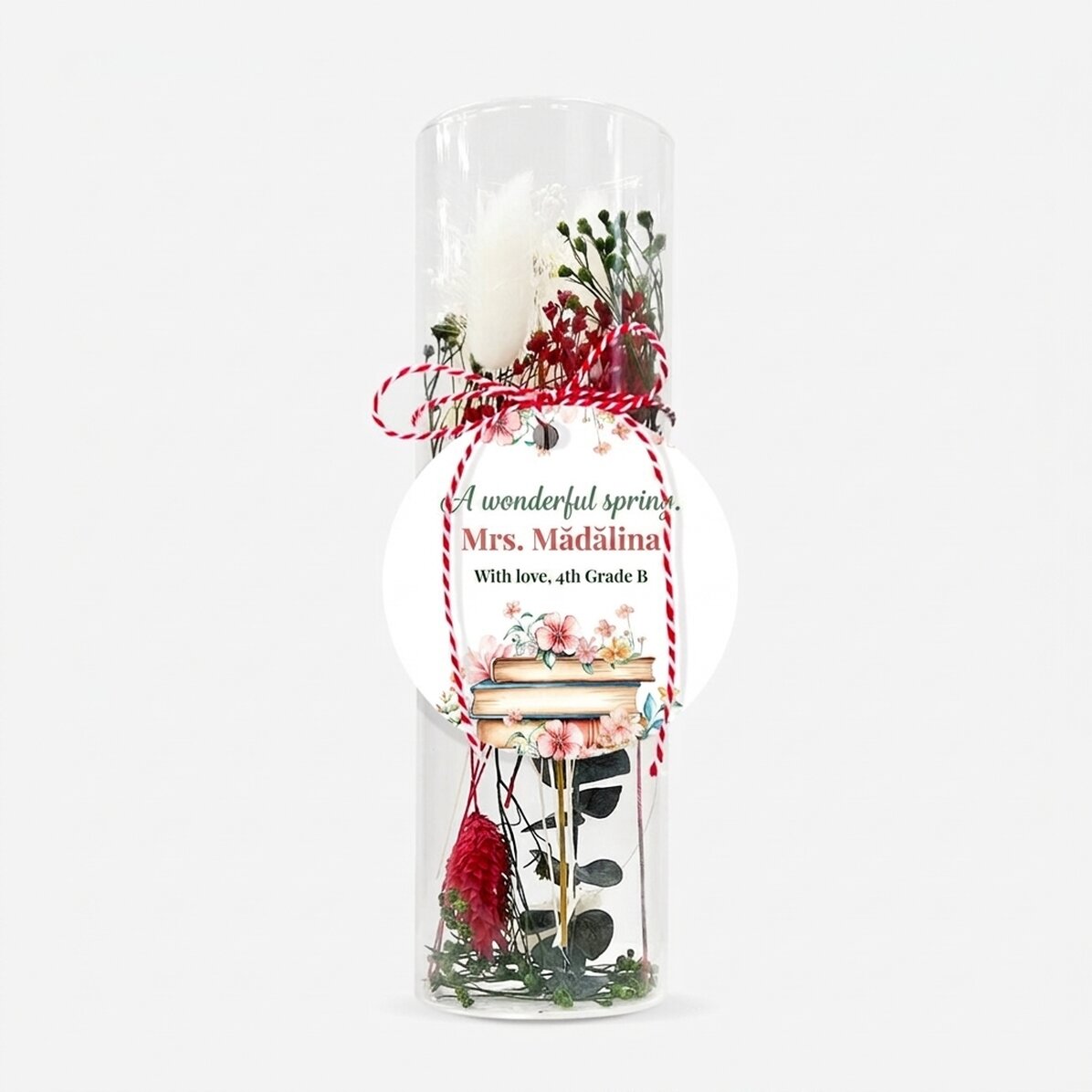Martisor-sieraad van glas met geconserveerde bloemen, gepersonaliseerd met een boodschap voor de ler