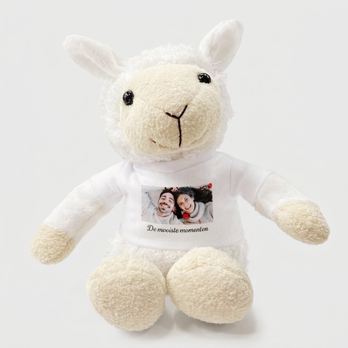 Plus een gepersonaliseerd schaap met een foto en tekst